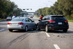 Post collision errors shown by vehicles stopped in original positions before crash scene documentation on a Florida roadway.